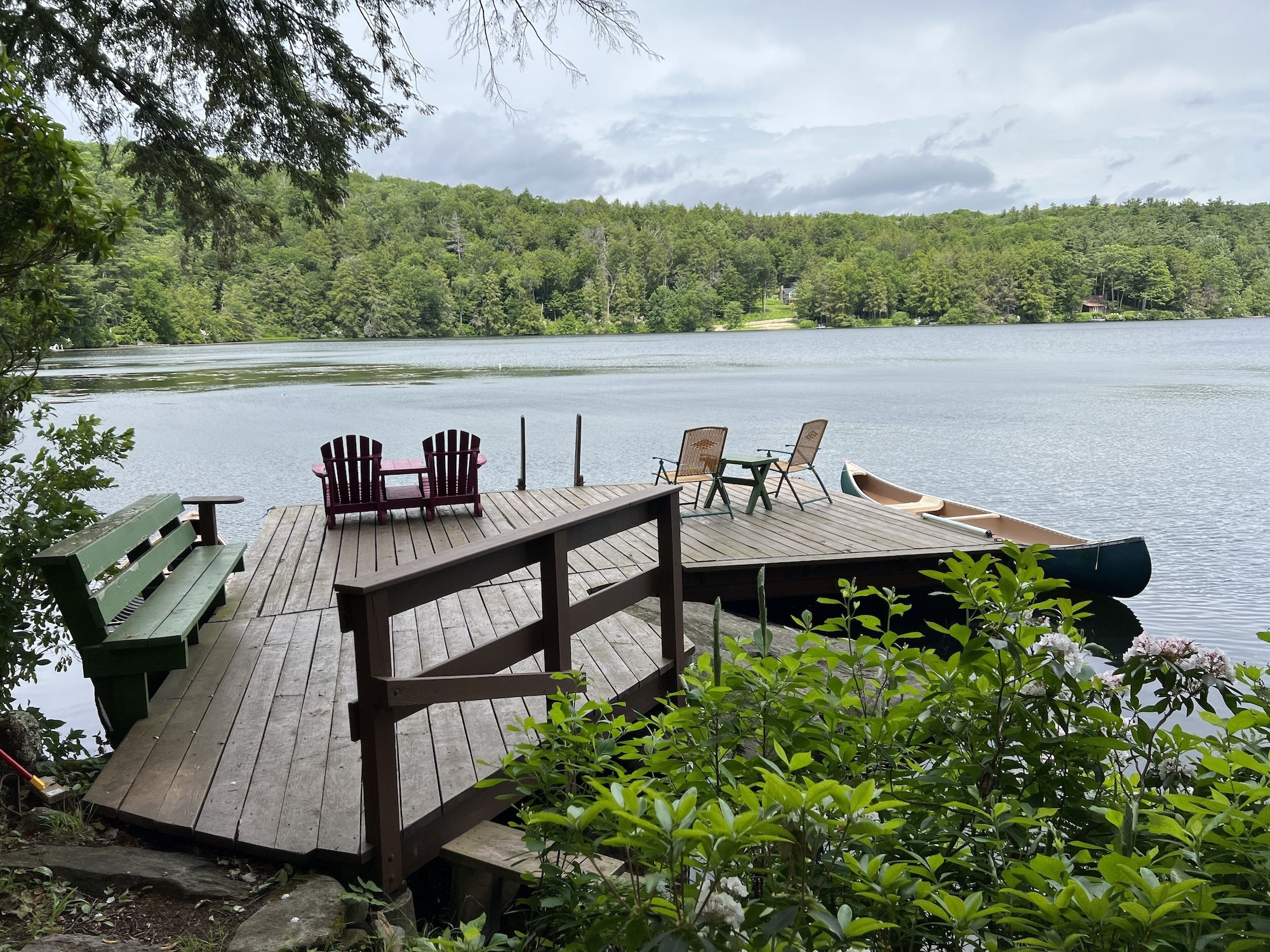 Ahh... lake life is the best. Two canoes for your explorations.
